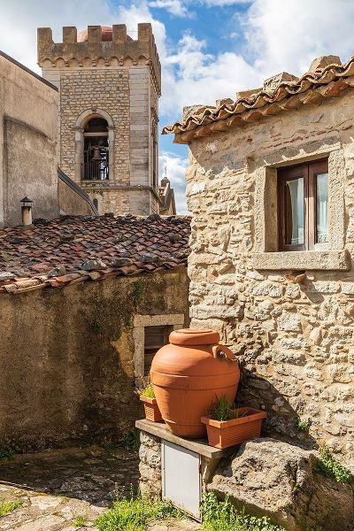 Messina Province-Montalbano Elicona Terra cotta urns next to old stone building